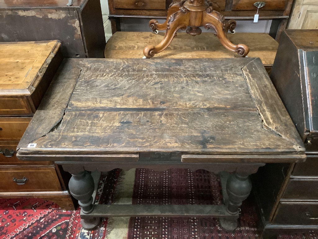 A 19th century Dutch oak extending refectory table, 212cm extended, width 76cm, height 81cm